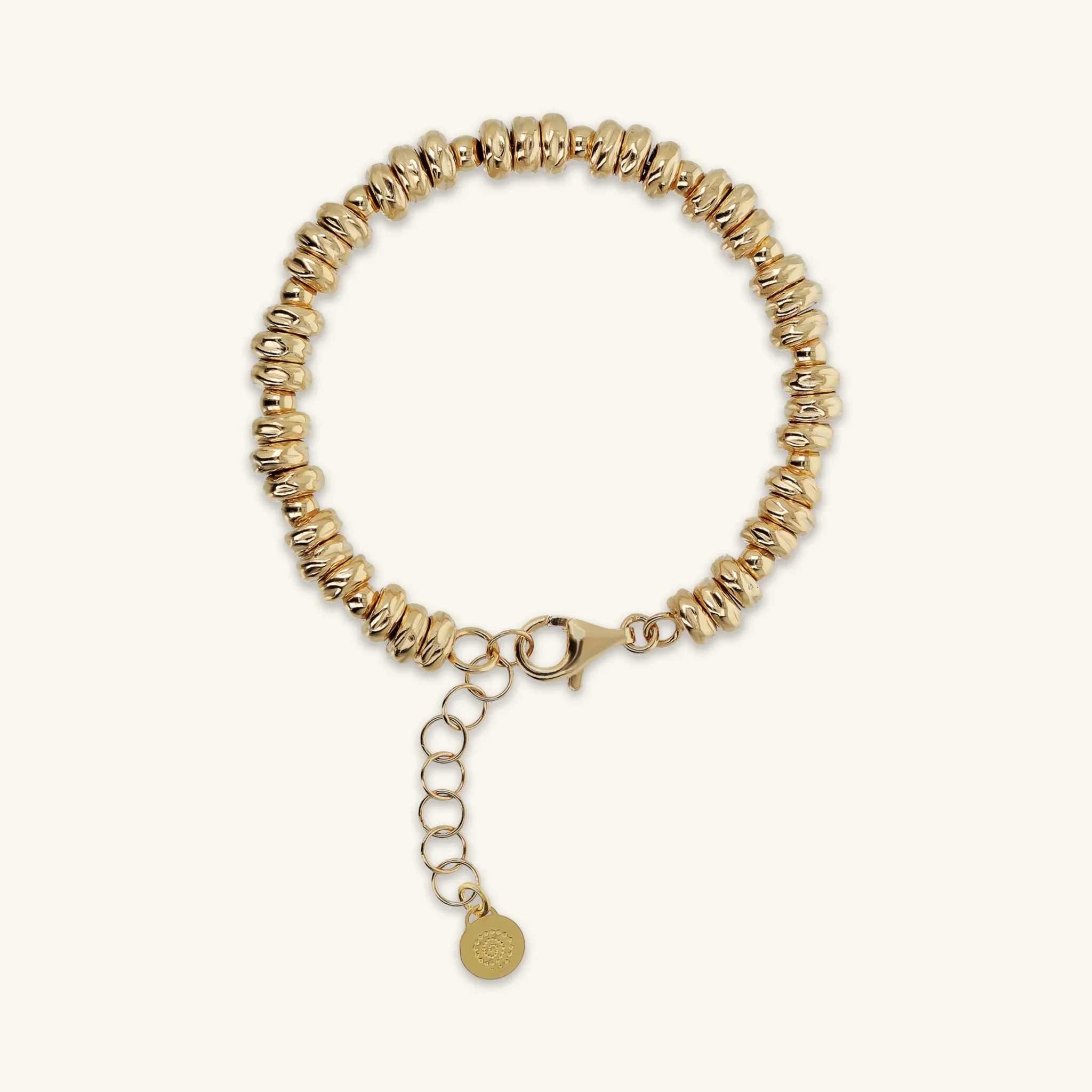 Bracciale con Rondelle Martellate e Sfere Lucide